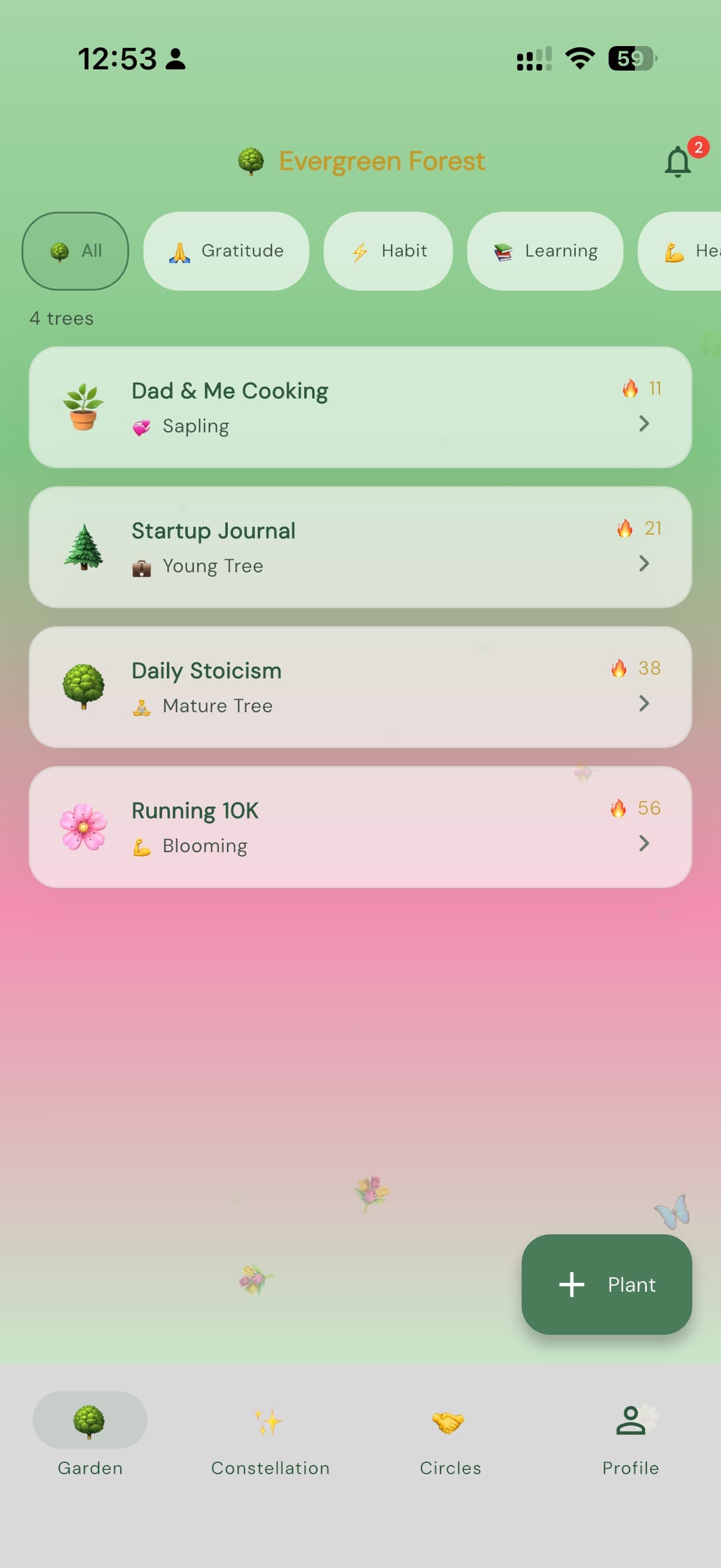 Treepisode app — main garden showing four trees with growth stages